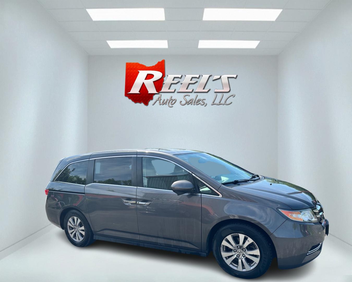 2015 Gray /Grey Honda Odyssey EX-L (5FNRL5H67FB) with an 3.5L V6 SOHC 24V engine, 6-Speed Automatic transmission, located at 547 E. Main St., Orwell, OH, 44076, (440) 437-5893, 41.535435, -80.847855 - Photo#3